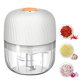 Mamicooker electric garlic chopper in a compact design for quick mincing.