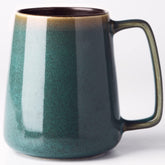 Masoline 24oz green mug with reactive glaze for unique color variations.