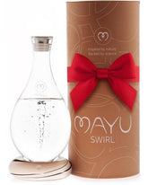 Mayu Swirl carafe pour spout in action for easy serving and refreshed hydration.