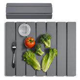 Meowoo Stone Drying Mat on kitchen counter keeps surfaces dry and organized