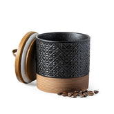 Miamolo ceramic jar with 20oz black lid on the counter keeps pantry items organized.