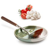 Miamolo ceramic spoon rest with gradient green base keeps utensils organized and stylish.