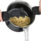 Michelangelo pasta pot with strainer lid shows easy draining for al dente pasta