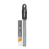Microplane Premium Classic Zester close-up on black handle for citrus zest