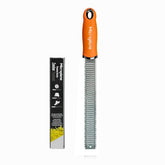 Microplane Premium Classic Zester Orange front view highlights ergonomic handle for easy zesting.