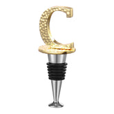Miicol wine stopper with gold letter C seals bottles while showcasing personalised style.