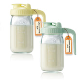Miradexic 32oz glass pitcher with lid and spout for precise, spill-free pouring.