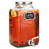 MiraEase 2-gallon glass dispenser with stainless steel spigot for easy pouring at events.