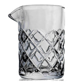 Mixologists cocktail mixing glass showing a heavy base and sturdy construction for stable stirring.