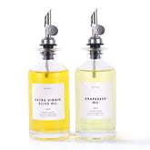 Molimoli oil and vinegar dispenser with glass bottles and metal pour spouts for precise drizzle.