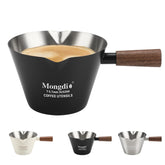 Mongdio espresso measuring cup with dual spouts for precise pouring.