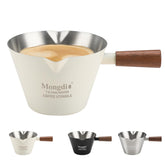 Mongdio espresso measuring cup in stainless steel for precise pouring control.