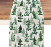 Moutina Christmas table runner 13x90 with green pine trees for festive dining.