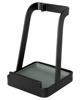 Mukkuri holder-lid stand on the kitchen counter keeps lids within easy reach.