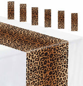 Munilail leopard print table runner on a long table for stylish party décor.