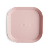Mushie square dinnerware plates in blush, front view, kid-friendly design for easy handling.