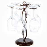 MyGift bronze stemware holder with scrollwork displaying wine glasses on a countertop