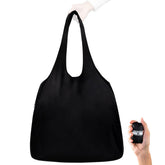 Nanobag XL foldable tote tucked in pocket for ultra-light daily errands