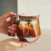 NeovaHome self-stirring mug with glass body blends coffee effortlessly.