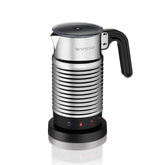 Nespresso Aeroccino 4 on kitchen counter froths milk for café-style drinks