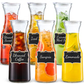 NETANY 6-piece glass carafes with lids show durable, spill-resistant storage for beverages