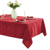 Newbridge Barcelona Damask tablecloth on a dining table for elegant dinners.