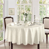 Newbridge Portofino ivory tablecloth, 70-inch round, ideal for elegant holiday entertaining.