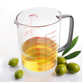 Newness 2-Cup Glass Measuring Cup with pour spout for mess-free pouring.
