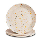 Nook Theory Celebration 8 inch bamboo plates stack displaying durable kid-friendly dinnerware