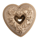 Nordic Ware Wildflower Heart Bundt pan top view highlights detailed floral design.