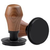 Normcore tamper with click feedback for consistent tamping on the espresso puck