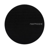 Normcore puck screen with titanium PVD coating, ready for durable espresso use and easy cleaning