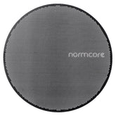 Normcore puck screen 53.3mm on tamp for even water flow and balanced extractions