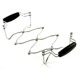 Norpro expanding trivet expanded to fit a large dish at the table, protecting surfaces.