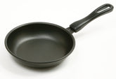 Norpro mini nonstick frying pan for eggs with easy release and even heating.