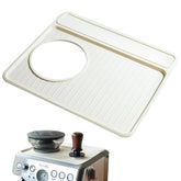 NOTSEK tamping mat on Breville top protects surface during coffee prep.