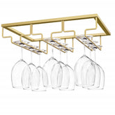 Nuovoware wine glass rack under cabinet in gold for clutter-free kitchen storage.