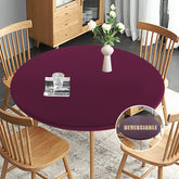Obstal burgundy round-tablecloth on table showing effortless stretch fit for secure indoor use.