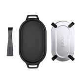 Ooni cast iron Sizzler Pan with removable handle for easy oven maneuvering.