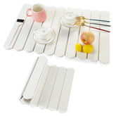 Ottkids stone drying mat on counter shows 24x16 size and quick absorption.