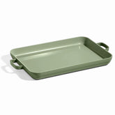 Our Place Griddle Pan on two burners showing a spacious cooking surface for multiple foods.