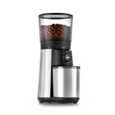 OXO Brew grinder, side view, highlighting durable stainless steel housing for steady use.