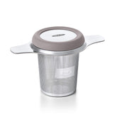 OXO Brew Tea Infuser Basket in a mug for easy loose leaf brewing.