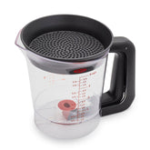 OXO Good Grips Good Gravy Fat Separator, top view, shows clear capacity and strainer