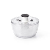 OXO Good Grips Little Salad Spinner shows one-handed pump for fast greens drying.