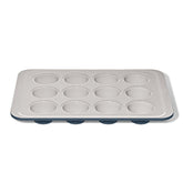 OXO Good Grips muffin pan with storm blue ceramic coating for easy release.