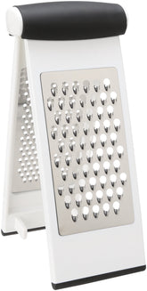 OXO Good Grips Multi Grater on a cutting board for stable upright grating