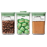 OXO Good Grips POP container set with pistachio lids for organized pantry storage.