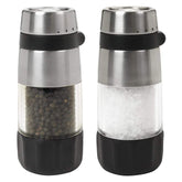 OXO Good Grips salt and pepper grinder set on kitchen counter for easy table-side seasoning.
