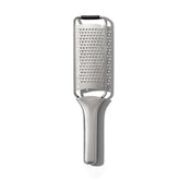 OXO Steel Grater with etched teeth for effortless cheese and vegetables.